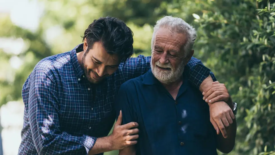 Young man walking with family in sobriety