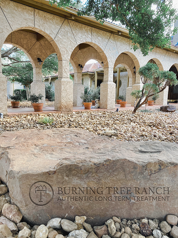 Photo of Engraved Rock with the Burning Tree Ranch Logo