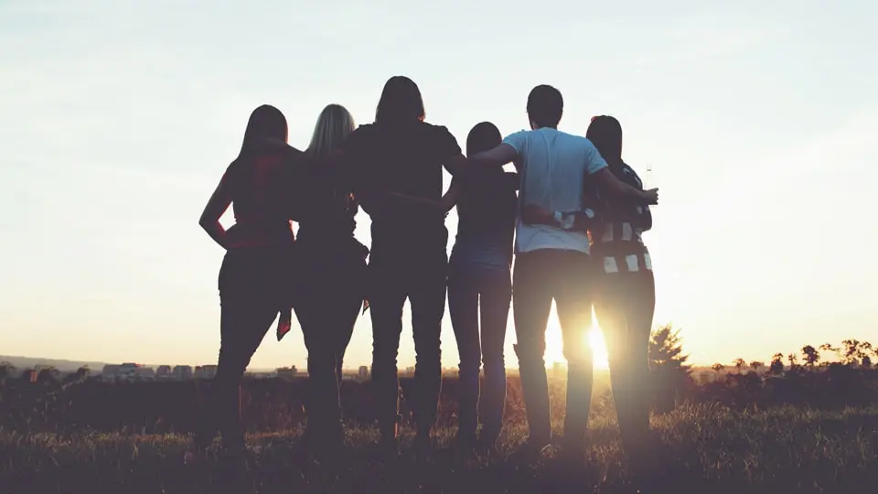 Young Adults Looking into the Sunset